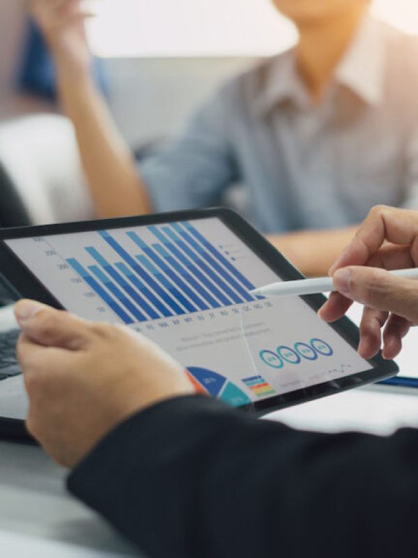 Two businessman consult analyzing company financial cash flow result. Concept for teamwork business corporate meeting and economy fund. Two businessman consult analyzing company financial cash flow result. Concept for teamwork business corporate meeting and economy fund.